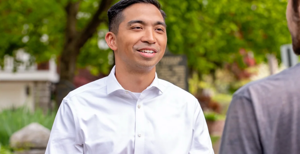 Orlando Sonza speaking outdoors during his 2024 congressional campaign in Cincinnati.