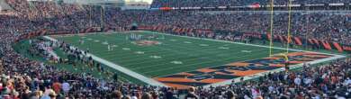 Fans pack Paycor Stadium during the Bengals vs. Patriots game, with the field and stadium atmosphere visible from the stands.