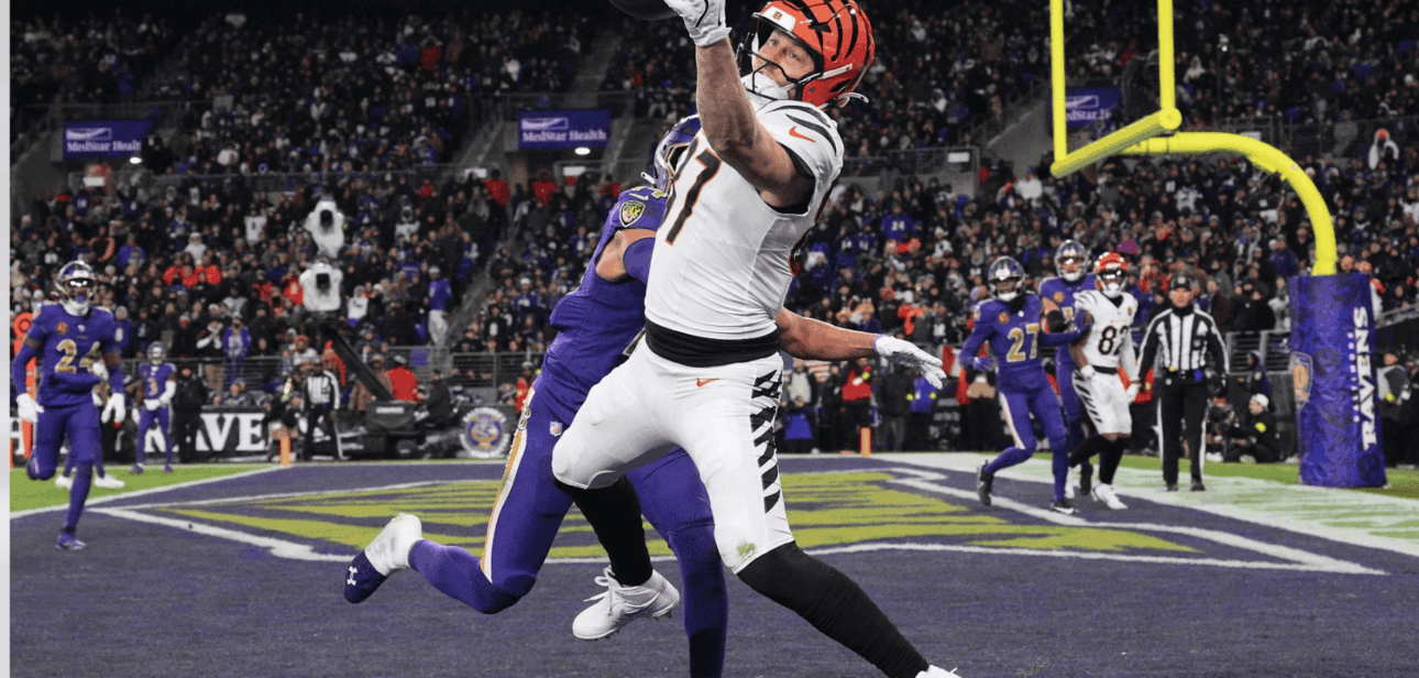 Cincinnati Bengals tight end Tanner Hudson makes a spectacular one-handed touchdown catch over Baltimore Ravens safety Kyle Hamilton during the Thanksgiving game.