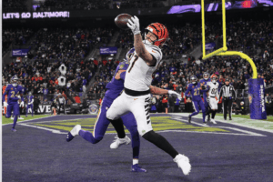 Cincinnati Bengals tight end Tanner Hudson makes a spectacular one-handed touchdown catch over Baltimore Ravens safety Kyle Hamilton during the Thanksgiving game.