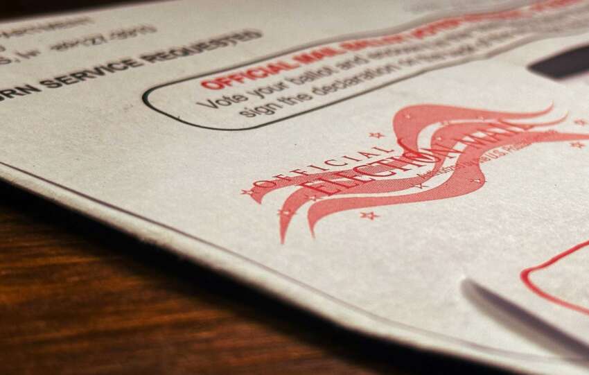 Cincinnati Republicans precinct map and voting materials on a desk, representing the GOP’s organizing challenges in city precincts