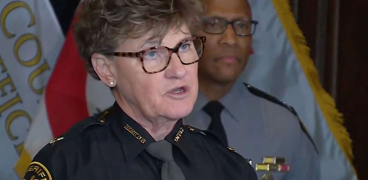 Uniformed police officials speak during a Cincinnati press conference on public safety initiatives.