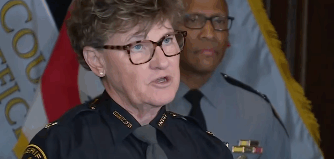 Uniformed police officials speak during a Cincinnati press conference on public safety initiatives.