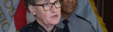 Uniformed police officials speak during a Cincinnati press conference on public safety initiatives.