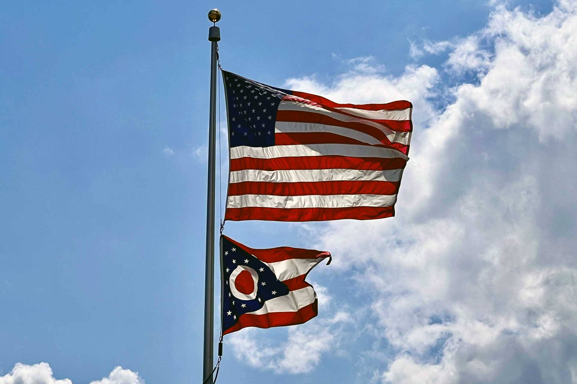 Ohio state flag waving in the wind, symbolizing the state’s effort to block foreign election influence.