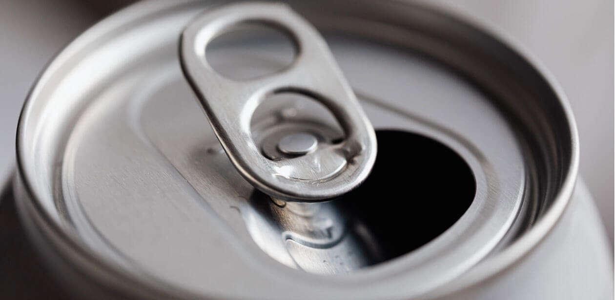 Close-up of a silver aluminum beverage can top representing hemp-derived THC drinks and seltzers.