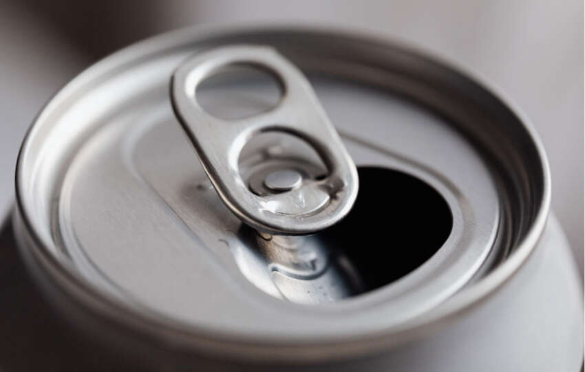 Close-up of a silver aluminum beverage can top representing hemp-derived THC drinks and seltzers.