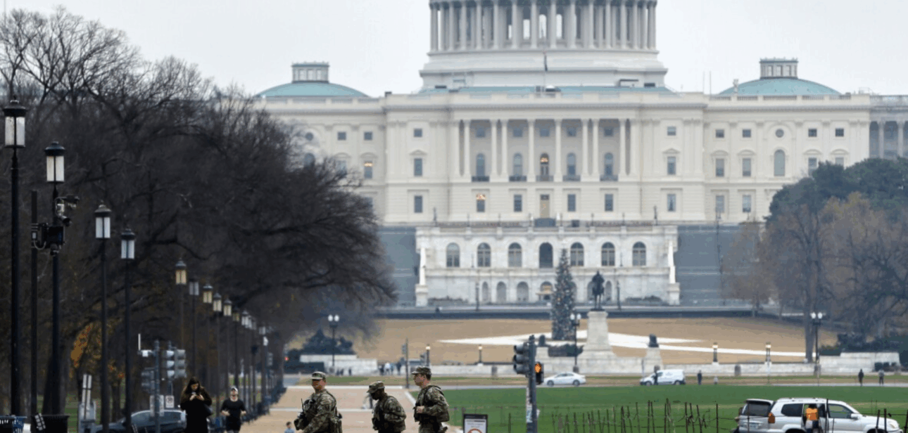National Guard members patrol near the U.S. Capitol amid investigation into fatal Washington D.C. shooting.