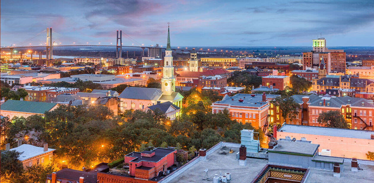 Savannah historic district in winter with oak-lined squares, Spanish moss, and quiet streets under soft January light