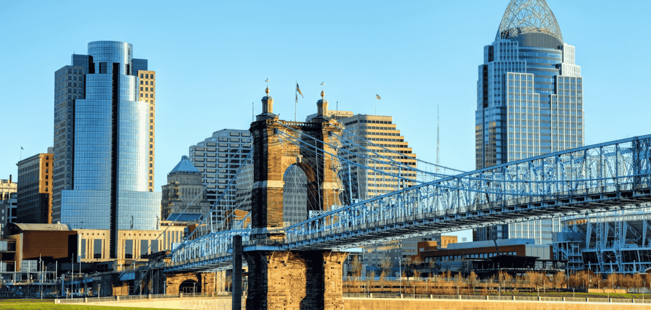Cincinnati skyline featuring the John A. Roebling Suspension Bridge over the Ohio River.