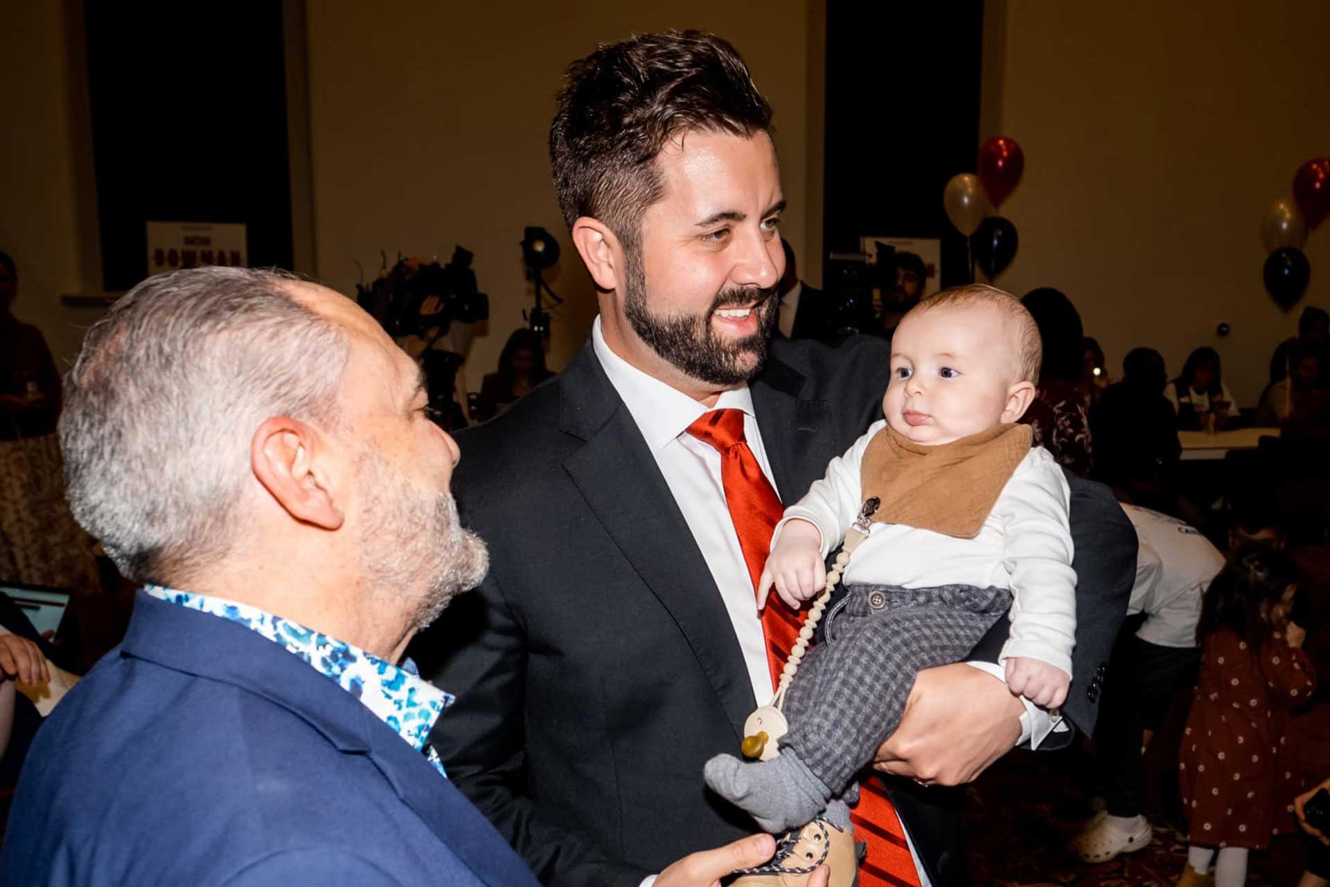 Cory Bowman speaking with supporters during the 2025 Cincinnati mayoral campaign.