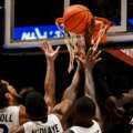 The Crosstown Shootout turns into the Trey Carroll game as Xavier outlasts Cincinnati 79–74