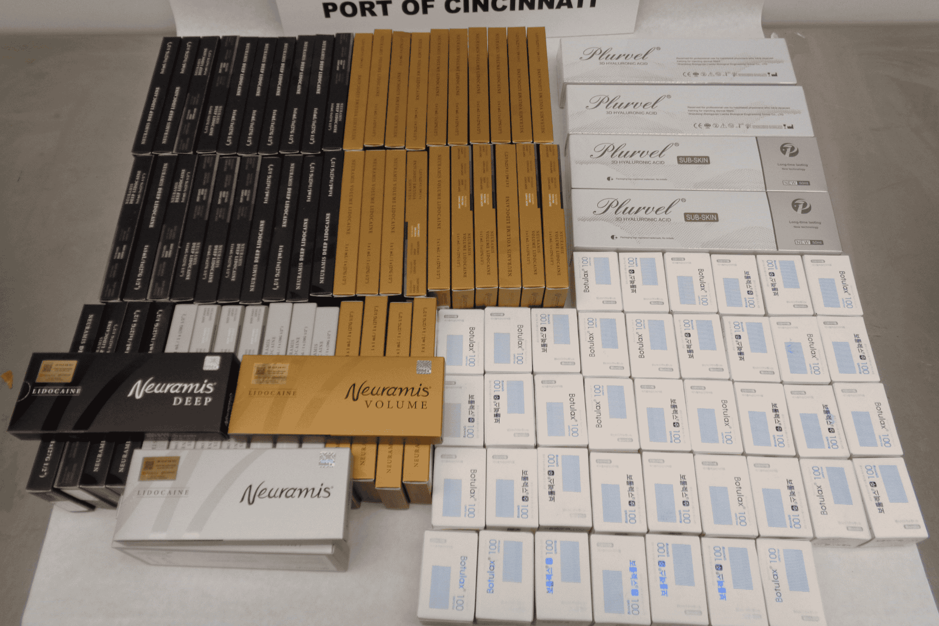 Assorted boxes of misbranded prescription drugs and contact lenses after authorities intercepted them at Cincinnati/Northern Kentucky International Airport.