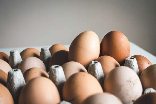 A pile of brown and white eggs used to illustrate common food myths about nutrition.