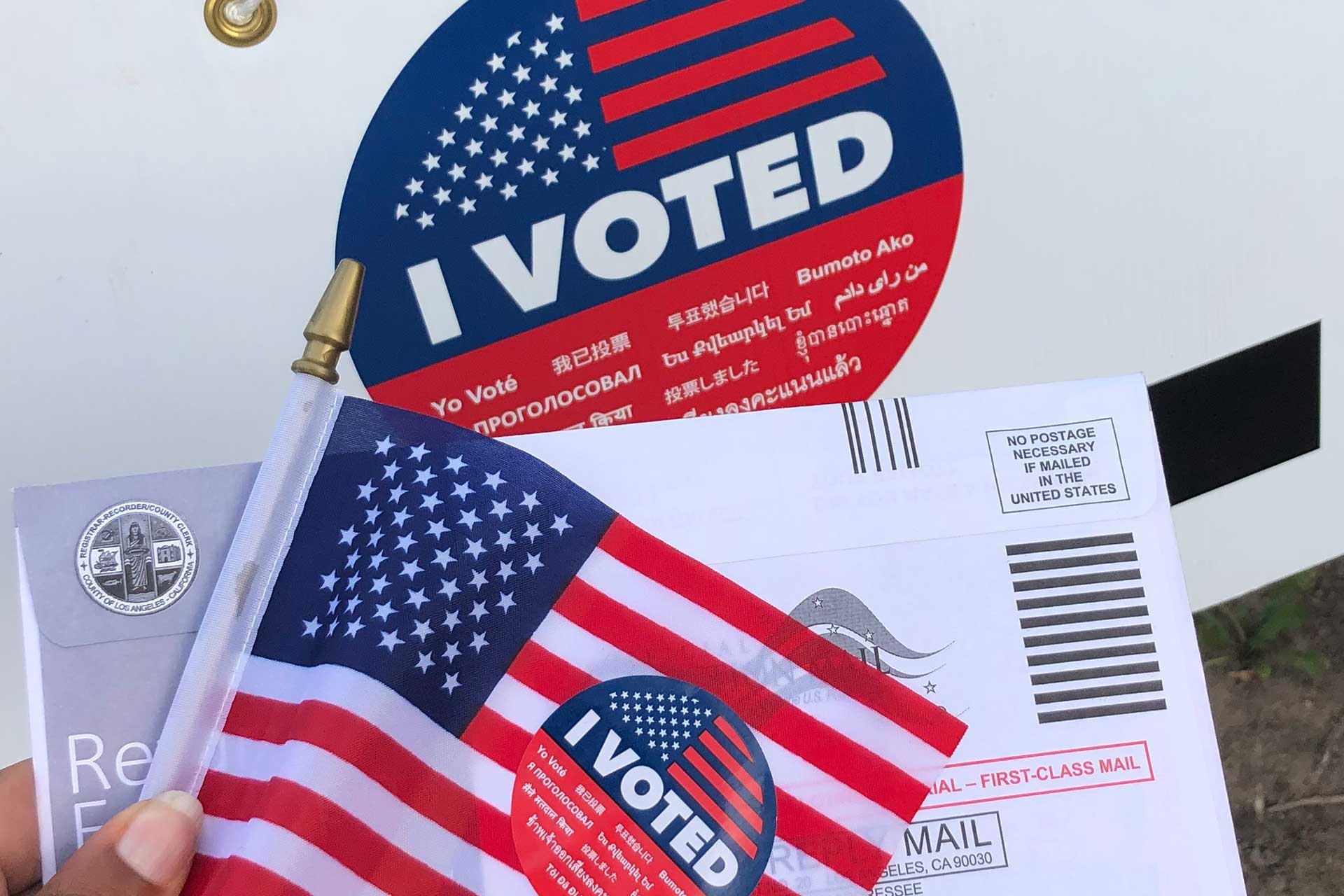 Ohio election integrity concept with absentee ballot, American flag, and “I Voted” sticker