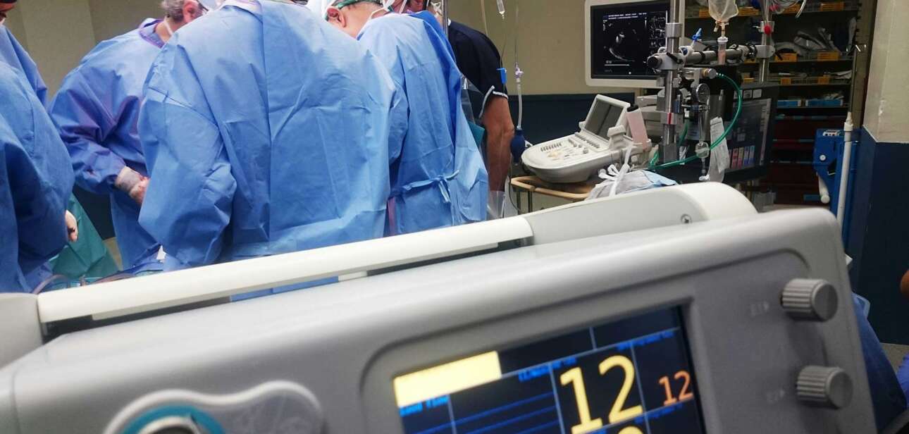 Safety-net hospital trauma team providing emergency care inside a Level I trauma center in Cincinnati.