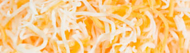 Close-up view of mixed shredded cheese blend affected by the 2025 recall.