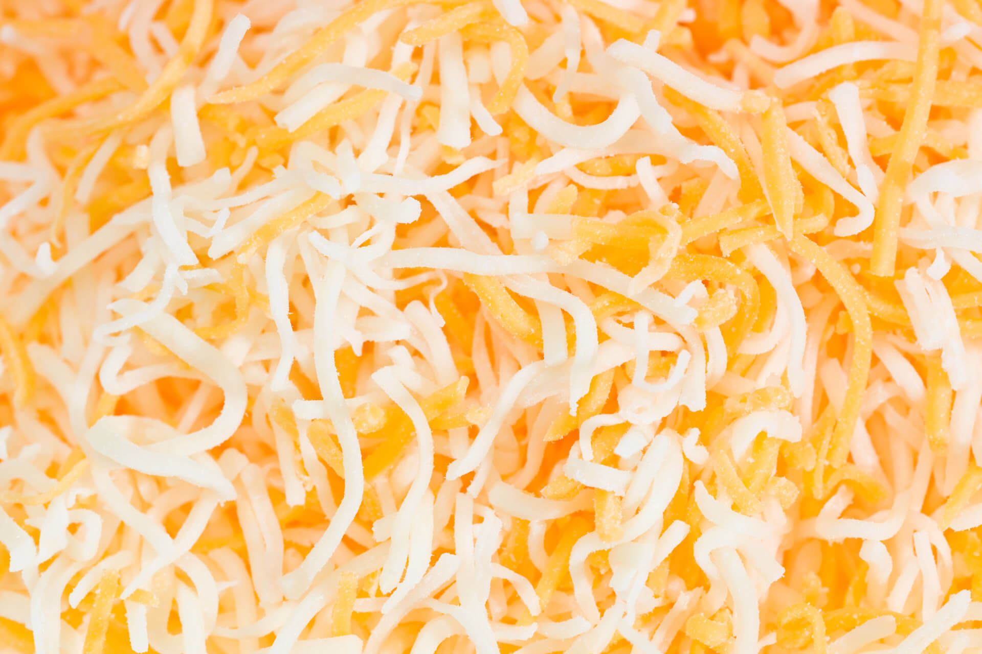 Close-up view of mixed shredded cheese blend affected by the 2025 recall.
