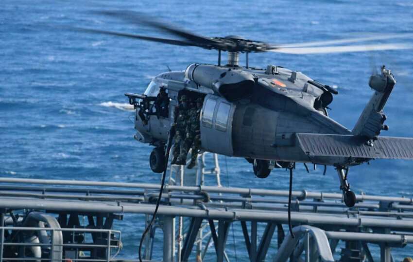 U.S. military personnel boarding an oil tanker during a sanctions enforcement operation involving Venezuelan oil