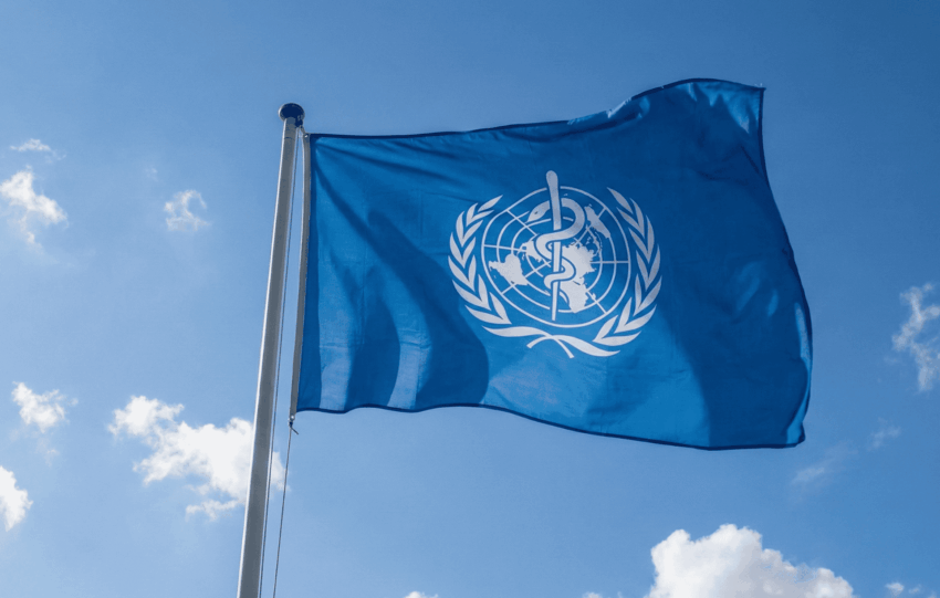 World Health Organization flag flying outside WHO headquarters amid U.S. exit announcement