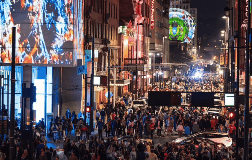 BLINK Cincinnati light festival crowds and ArtsWave public art installation at night.