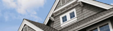 Residential rooftops against a blue sky, illustrating the housing shortage in Kentucky and rising real estate demand.