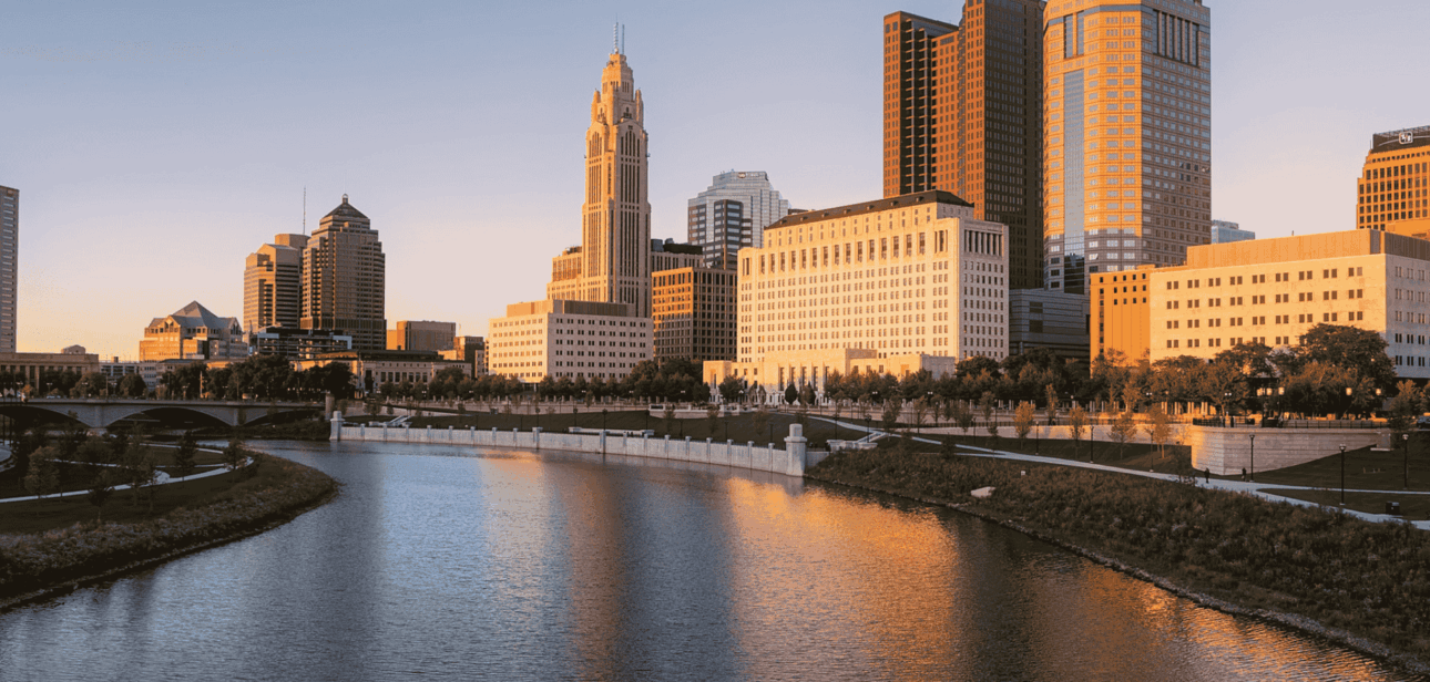 Downtown Columbus skyline overlooking the Scioto River, serving as the backdrop for 2026 Ohio Capital Budget legislative sessions.