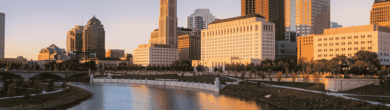 Downtown Columbus skyline overlooking the Scioto River, serving as the backdrop for 2026 Ohio Capital Budget legislative sessions.
