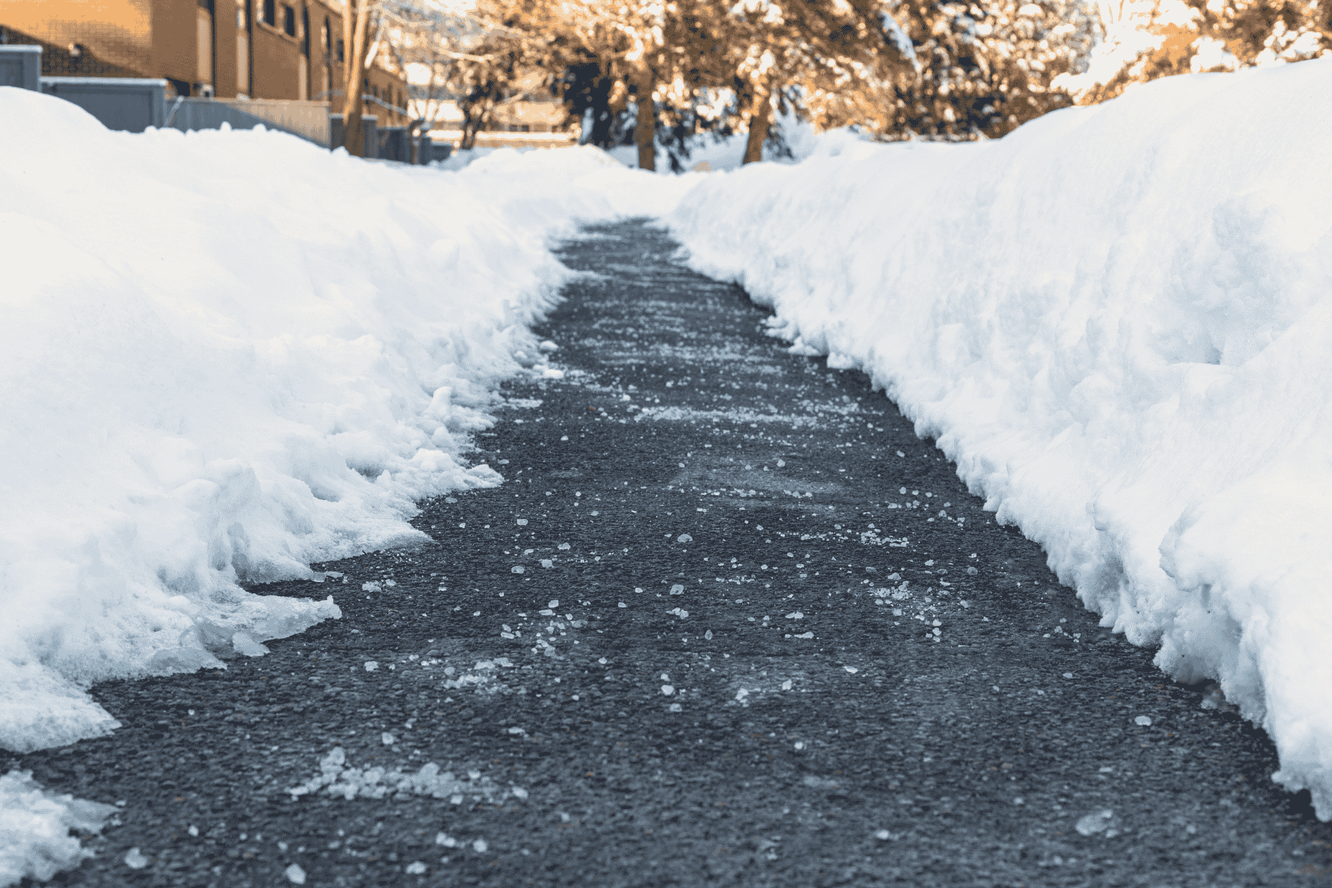 Snow-lined sidewalk cleared after winter storm in Cincinnati