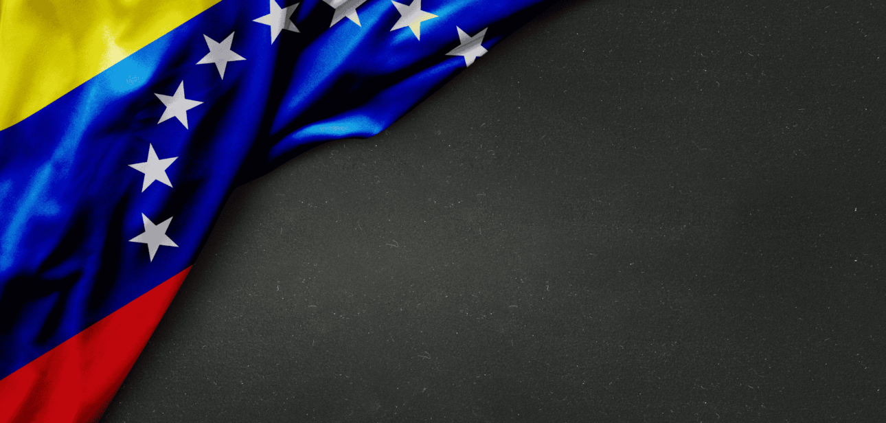 Flag of Venezuela serving as a backdrop for news regarding Cincinnati protests against US military actions.