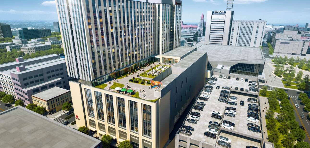 Architectural aerial rendering of the proposed Cincinnati Convention Headquarters Hotel, featuring a tall modern tower and lower terraced sections with green roofs.
