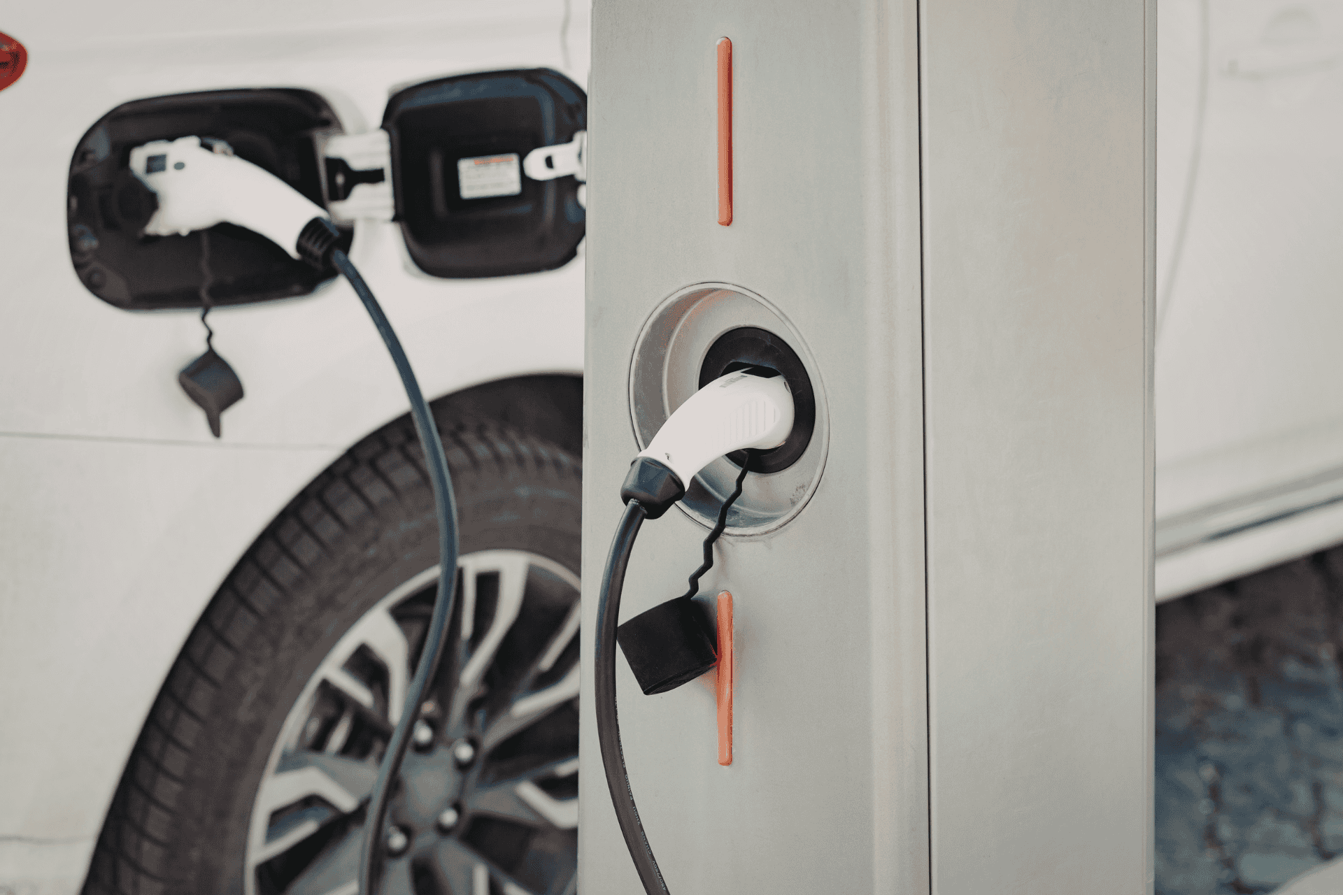Electric vehicle plugged into a public charging station in Cincinnati, Ohio.