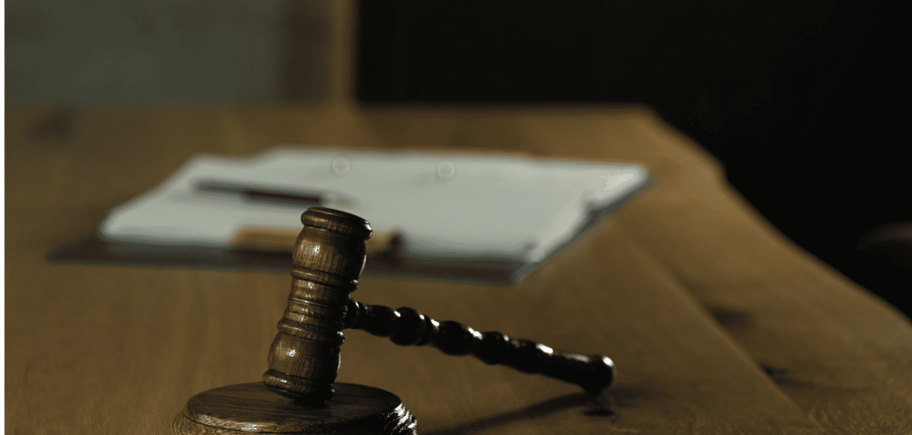 A wooden judge's gavel symbolizing legal proceedings regarding the In Between Tavern in Cincinnati.