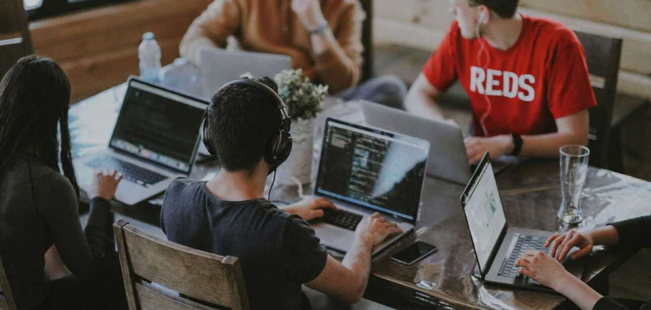 Cincinnati growth strategy discussion with team reviewing AI and business planning