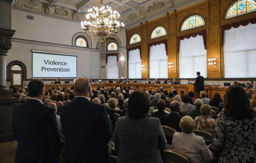 Residents attend a Cincinnati City Council meeting focused on public safety accountability and violence prevention