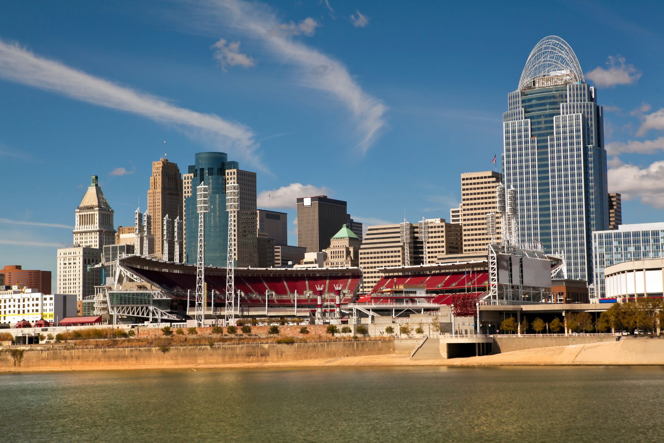 The Cincinnati skyline and Great American Ball Park sit along the Ohio River, highlighting the city's riverfront sports infrastructure.