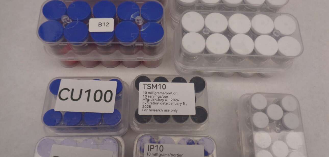 Several trays of confiscated peptide vials and medical bottles labeled CU100 and TSH10 from a CBP seizure in Cincinnati.