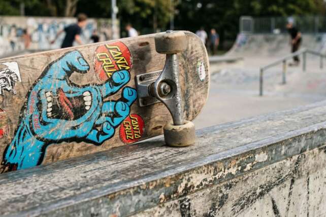 A sample close-up image of a skateboard resting on a ledge at the Camp Washington skatepark in Cincinnati.