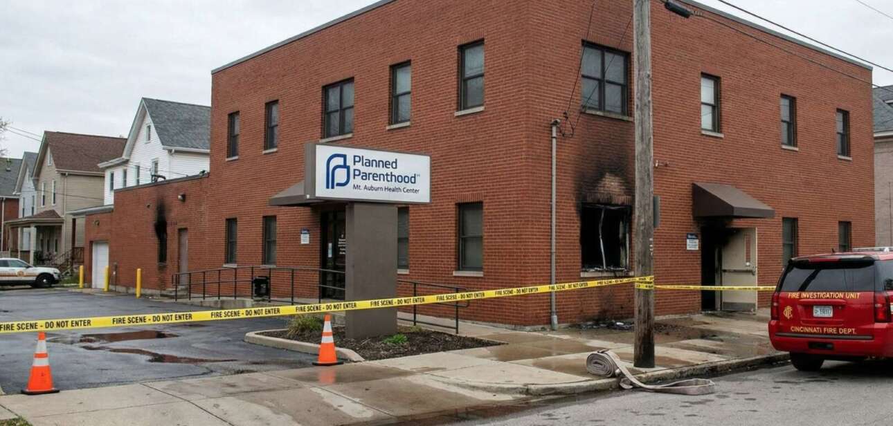 Cincinnati Planned Parenthood building cordoned off with yellow caution tape during a fire investigation.