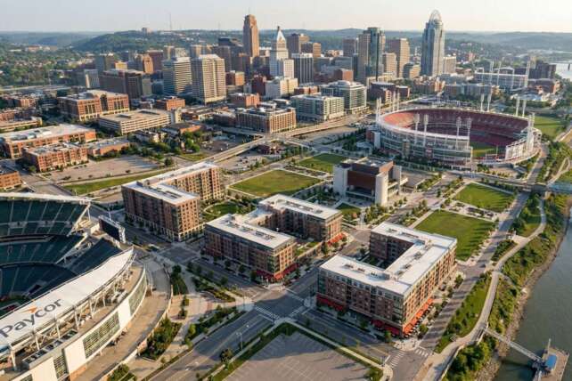 Aerial view of The Banks development in downtown Cincinnati highlighting the final construction lots along the riverfront.