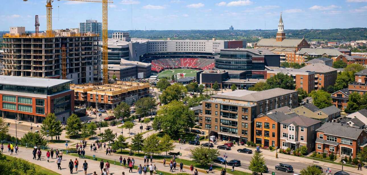 University of Cincinnati campus showing rapid growth, student activity, and new construction in Uptown Cincinnati
