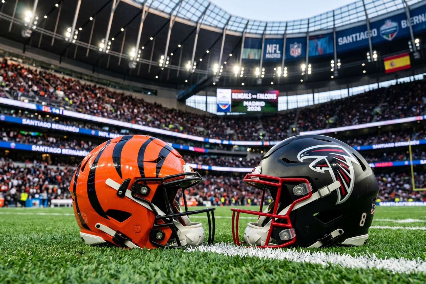 Cincinnati Bengals and Atlanta Falcons helmets facing each other on a football field, representing the 2026 NFL International Series game in Spain.