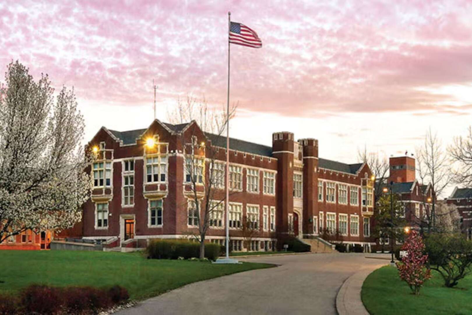 Large red brick building with white architectural details on the Hebrew Union College campus, related to the Cincinnati rabbinical school lawsuit.