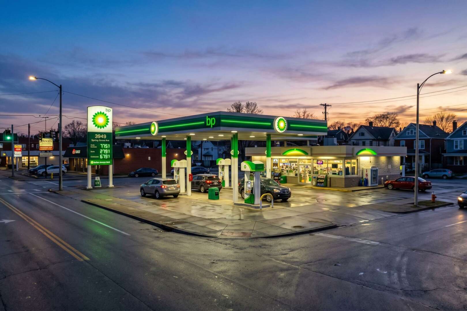 A BP gas station at dusk in Cincinnati's Northside neighborhood, with cars parked at the pumps and a brightly lit convenience store.