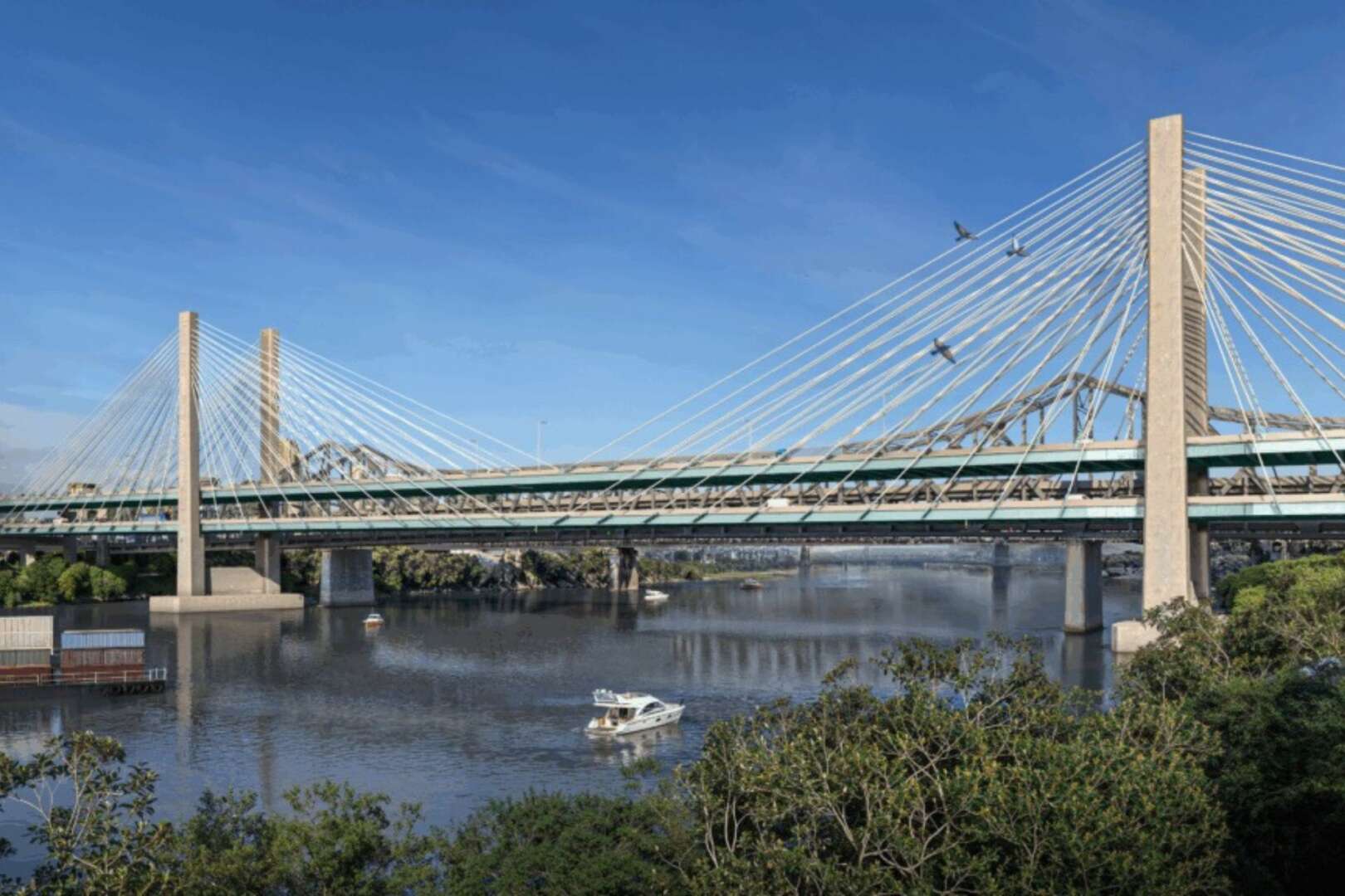 A cable-stayed bridge crossing a river on a clear day, illustrating the Brent Spence Bridge corridor in downtown Cincinnati.