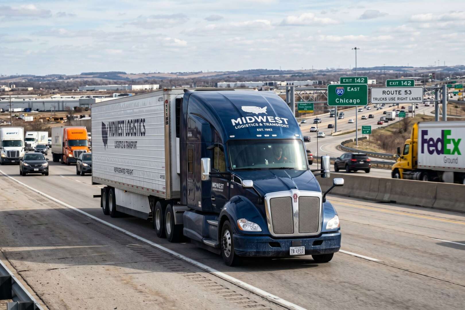 A blue commercial semi-truck driving on a busy multi-lane highway, illustrating the growth of logistics and trucking jobs in Cincinnati.