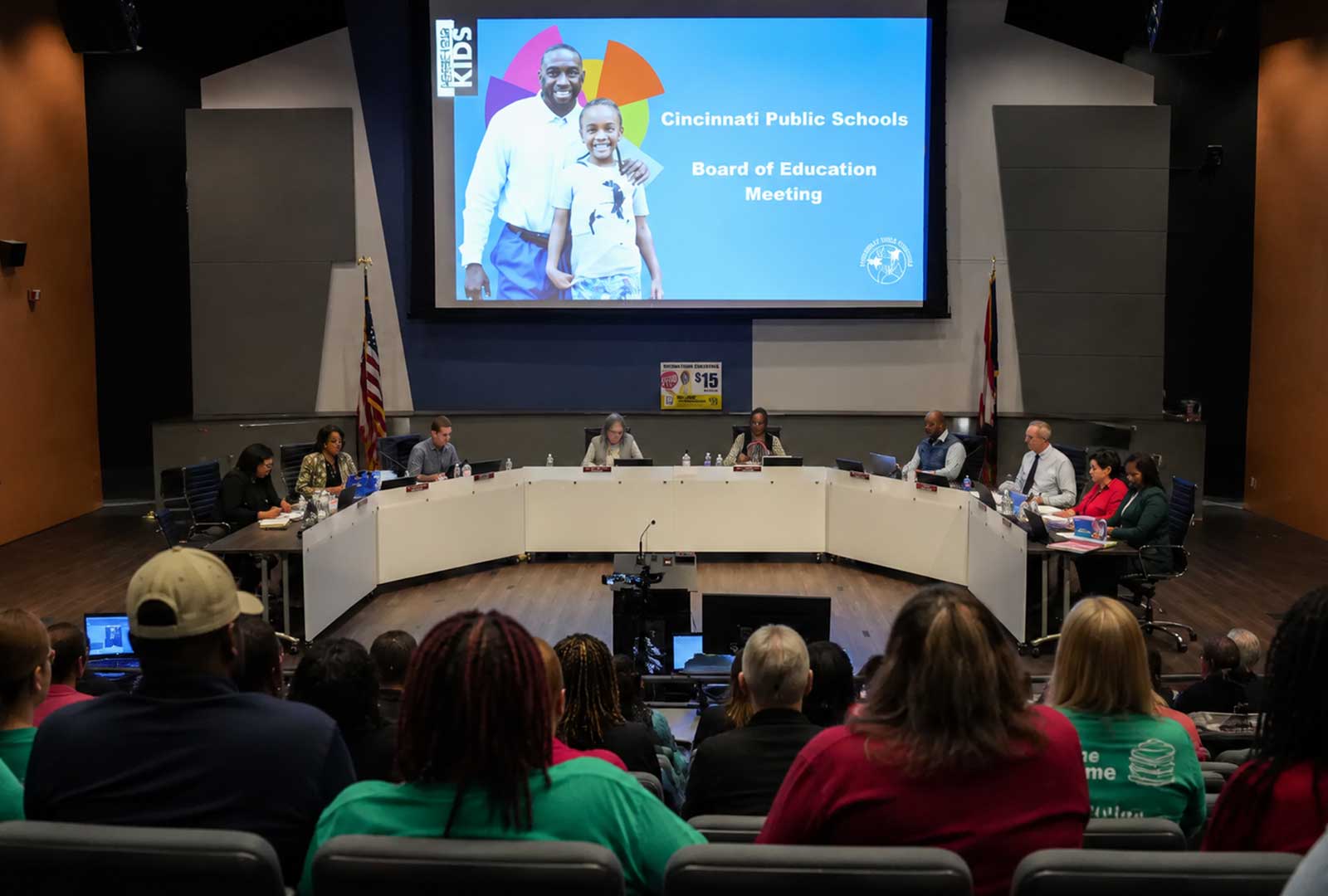 Cincinnati earnings tax CPS Board of Education meeting as members debate a proposed 0.75% earned income tax levy before a packed public audience.