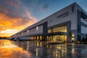 Exterior view of a modern industrial logistics facility at sunset, illustrating Cincinnati's industrial real estate market.