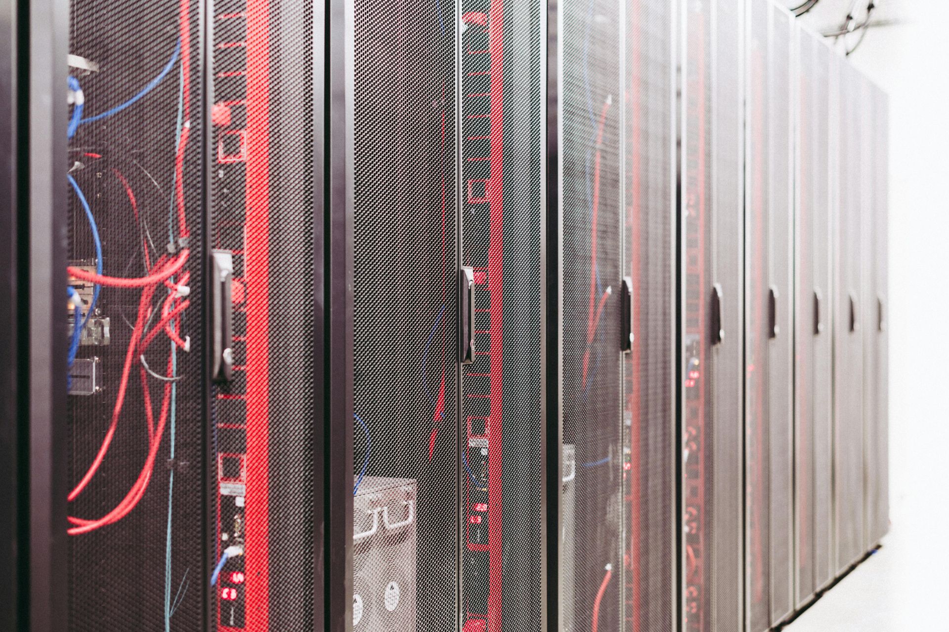 Aisle of active server racks representing an Amazon data center in Greater Cincinnati.