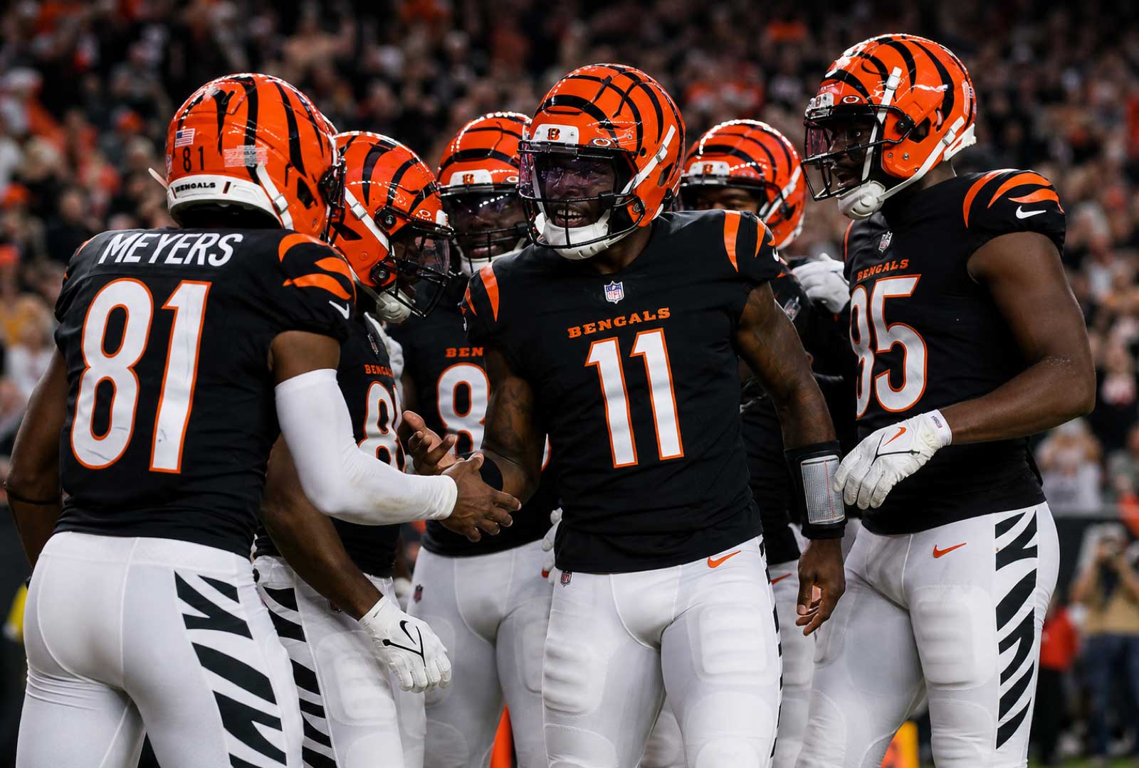 Bengals roster battles intensify as Cincinnati players gather during a preseason game at Paycor Stadium.